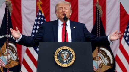 Donald Trump speaking at podium