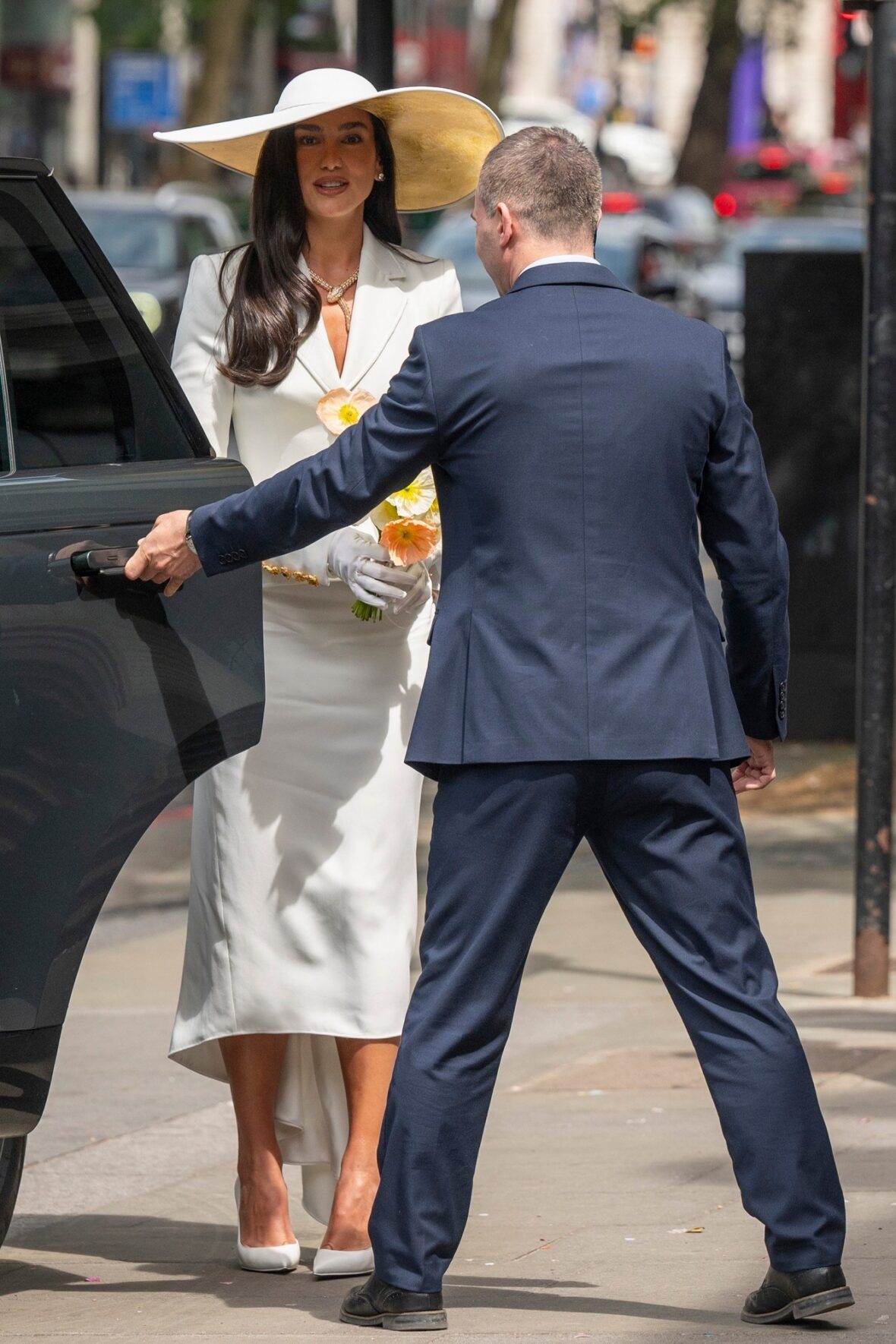 Dua Lipa and Callum Turner wedding photos