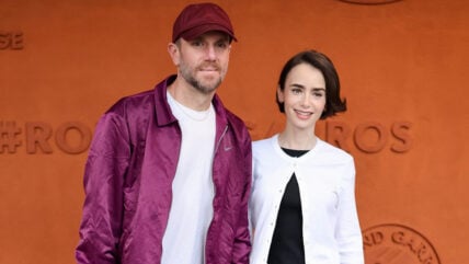 Lily Collins and Charlie McDowell pose at French Open