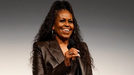 Michelle Obama speaking on stage