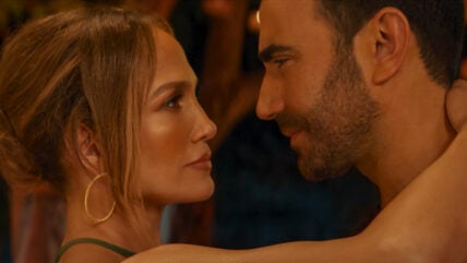 Jennifer Lopez and Brett Goldstein in an OFFICE ROMANCE still