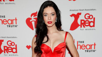 Sasha Pieterse in a red dress for an event